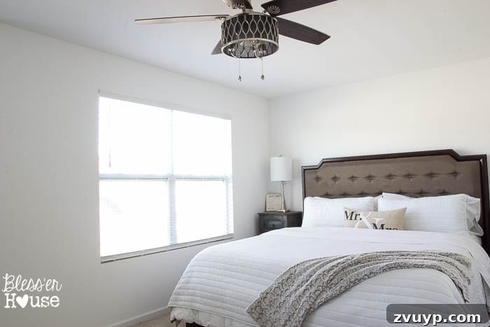 Unveiling Our Rustic Modern Sanctuary: Master Bedroom Decor & Shopping Guide 8 Master bedroom with refreshed windows, featuring DIY craftsman trim, woven shades, and white curtains