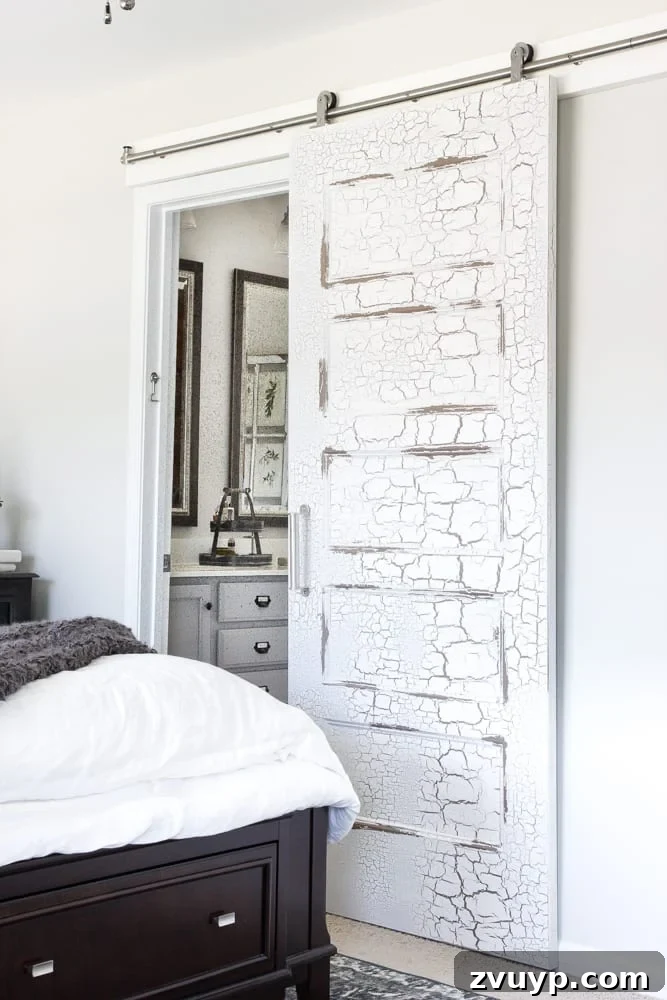 Unveiling Our Rustic Modern Sanctuary: Master Bedroom Decor & Shopping Guide 7 Close up of distressed sliding barn door detail, adding texture to the master bedroom