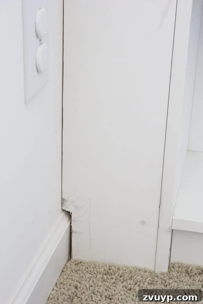 notched out baseboard for built ins