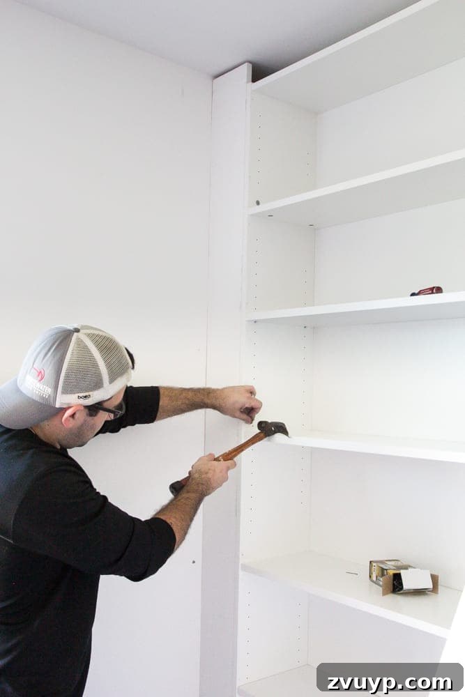 securing bookcase to wall to make built in shelves