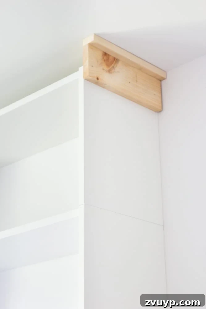 Craftsman style header on bookcase to make built ins