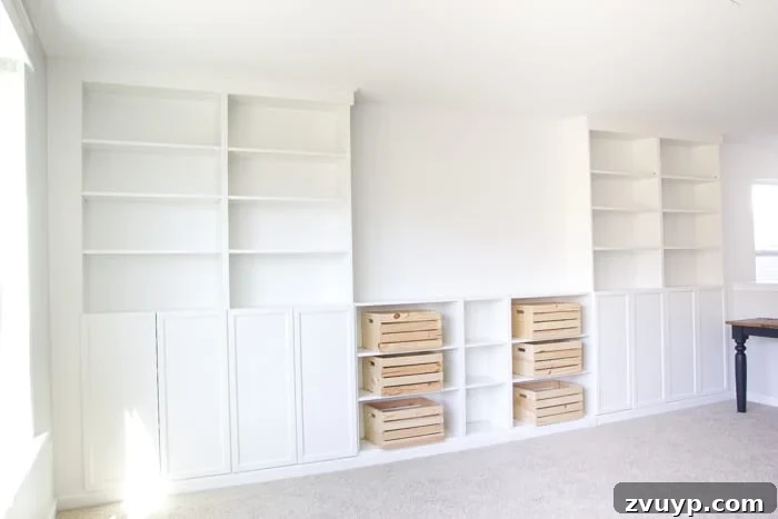 IKEA Bookcase to Seamless Built-In Shelving 27 DIY Built Ins from IKEA Billy Bookcases + One Room Challenge Week 2 | blesserhouse.com - A step-by-step tutorial for how to make professional looking built in bookshelves using IKEA Billy bookcases for vertical storage.