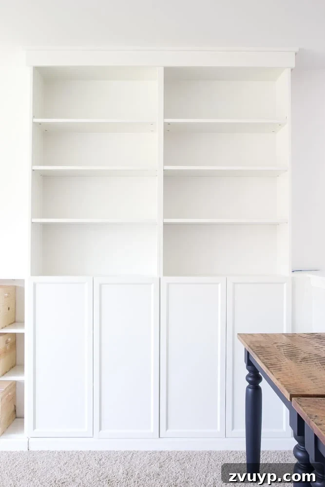 IKEA Bookcase to Seamless Built-In Shelving 29 DIY Built Ins from IKEA Billy Bookcases + One Room Challenge Week 2 | blesserhouse.com - A step-by-step tutorial for how to make professional looking built in bookshelves using IKEA Billy bookcases for vertical storage.