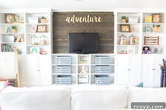 IKEA Bookcase to Seamless Built-In Shelving 6 Completed DIY built-in bookshelves with wood blank wall in a playroom