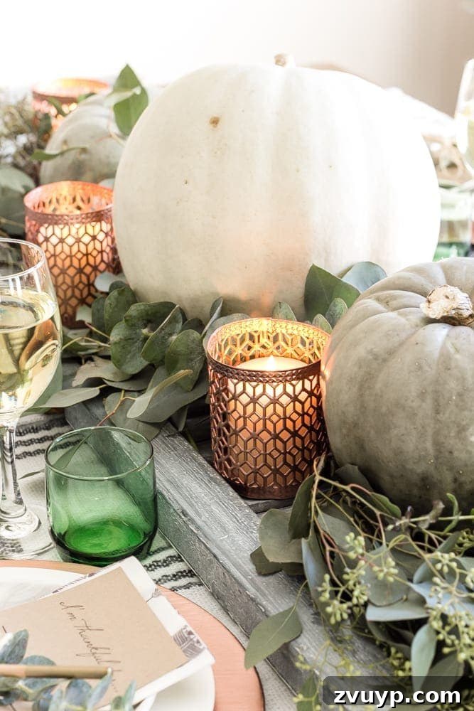 Green Copper Thanksgiving Table Inspiration and Printables 12 Close-up of copper candle holders and green accents on the Thanksgiving table