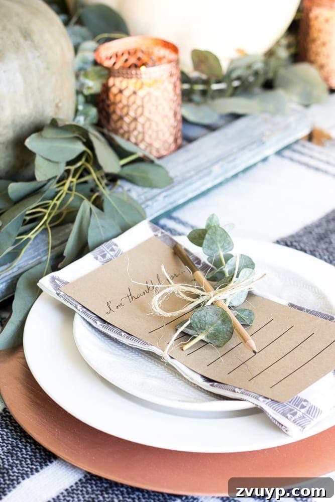 Green Copper Thanksgiving Table Inspiration and Printables 16 Side view of the Thanksgiving tablescape highlighting the greenery and copper