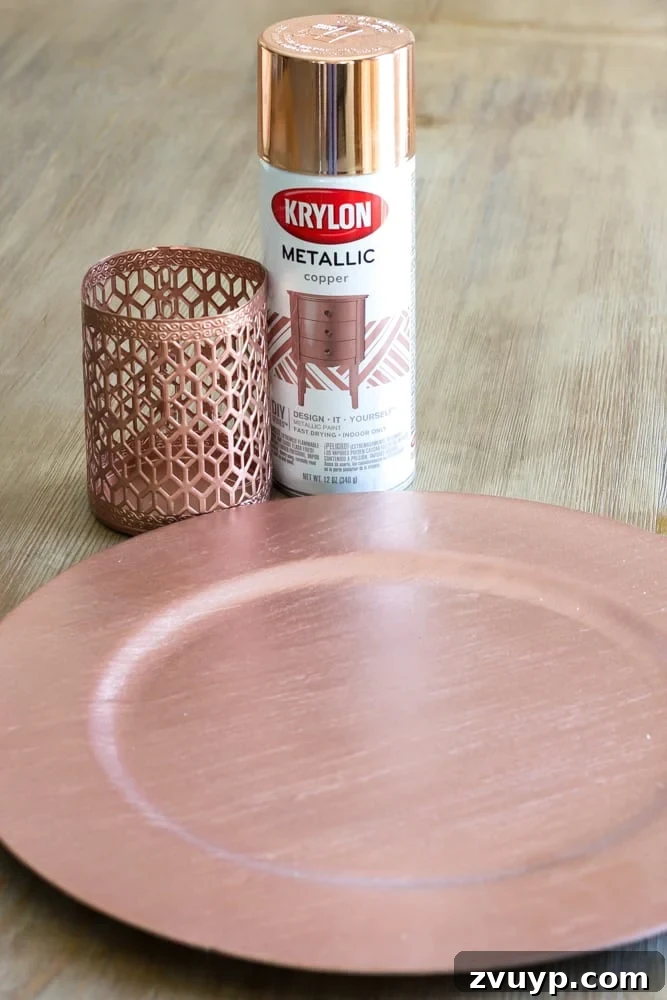 Green Copper Thanksgiving Table Inspiration and Printables 3 Close-up of DIY copper spray-painted chargers and candle holders for Thanksgiving