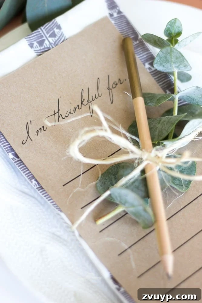 Green Copper Thanksgiving Table Inspiration and Printables 10 Overhead view of a Green and Copper Thanksgiving Tablescape with 'thankful' cards