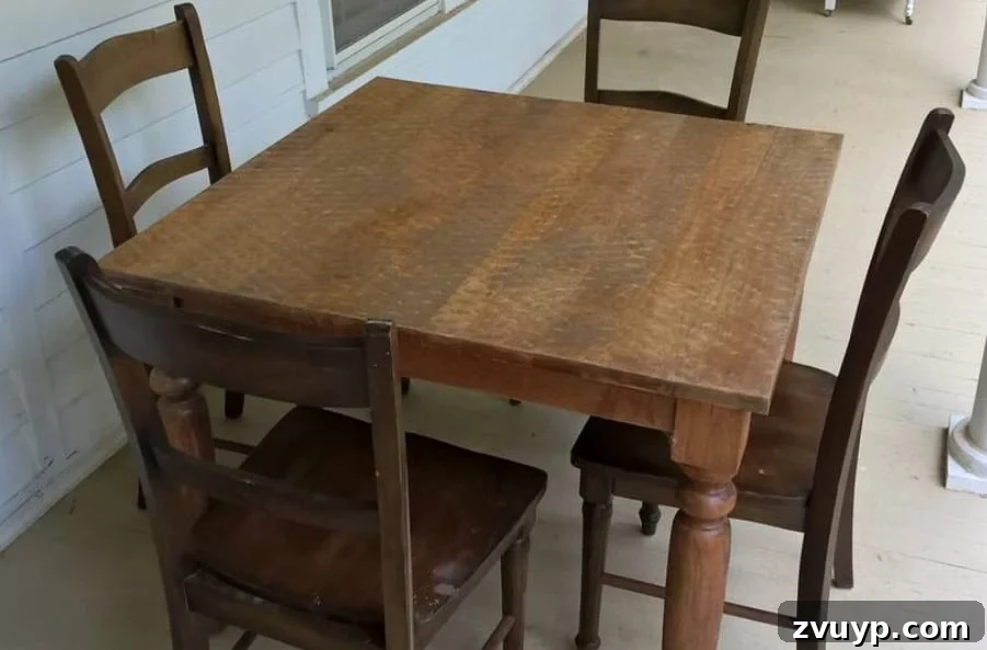 Transforming a Kitchen Table into Wall Desks ORC Week 3 Update 3 An old kitchen table before being cut in half, showcasing its potential for repurposing into two desks.