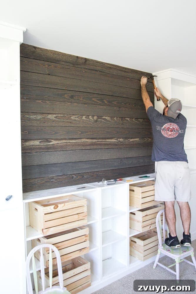 DIY Wood Plank Focal Wall for One Room Challenge Week 4 7 DIY Reclaimed Wood Plank Focal Wall | blesserhouse.com - How to install a reclaimed wood plank focal wall in under an hour to create contrast, texture, and character in any space.