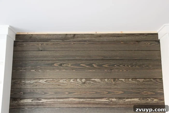 DIY Wood Plank Focal Wall for One Room Challenge Week 4 8 DIY Reclaimed Wood Plank Focal Wall | blesserhouse.com - How to install a reclaimed wood plank focal wall in under an hour to create contrast, texture, and character in any space.