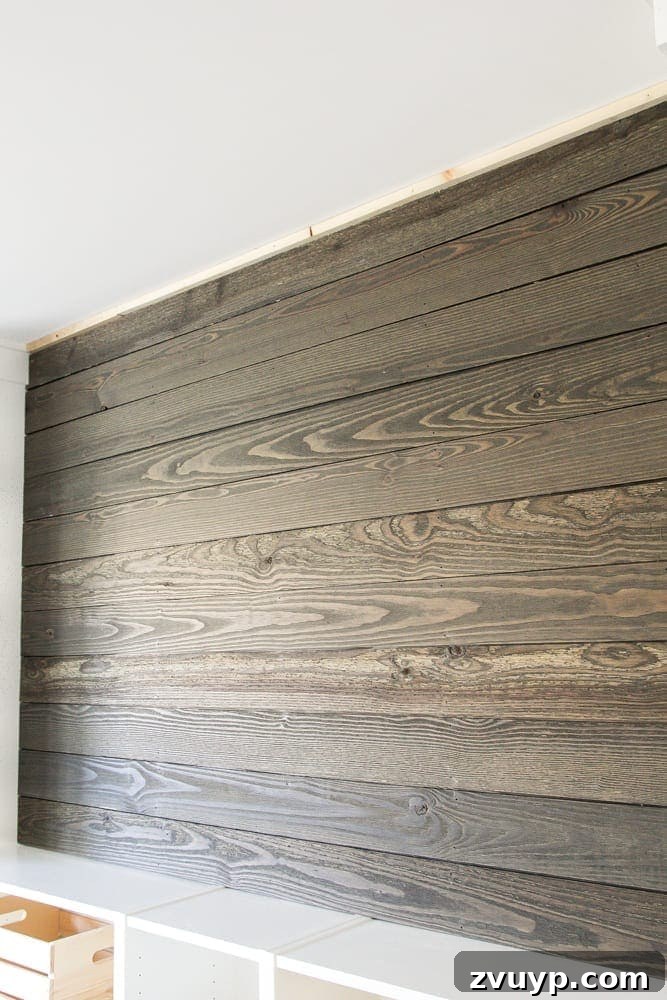 DIY Wood Plank Focal Wall for One Room Challenge Week 4 9 DIY Reclaimed Wood Plank Focal Wall | blesserhouse.com - How to install a reclaimed wood plank focal wall in under an hour to create contrast, texture, and character in any space.