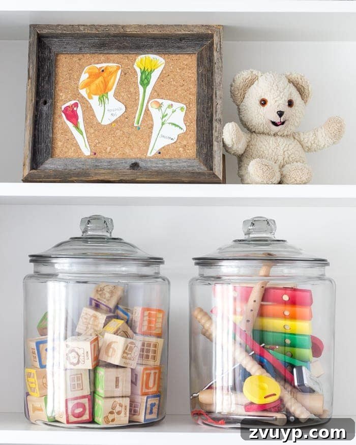 One Room Challenge Week 6 Our Eclectic Farmhouse Playroom Is Here 13 Hocking jars for toy storage on built-in shelves - decorative and functional.