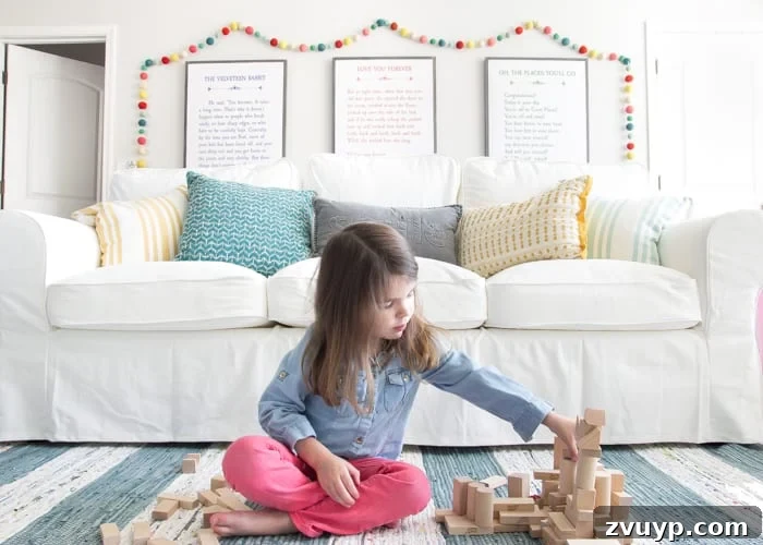 One Room Challenge Week 6 Our Eclectic Farmhouse Playroom Is Here 36 Olivia playing in the newly designed eclectic farmhouse playroom.