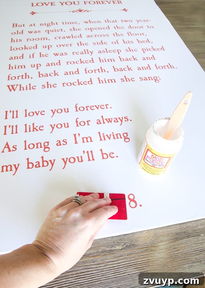 Create Your Own Storybook Magic 7 Applying Engineer Print to Plywood with Mod Podge