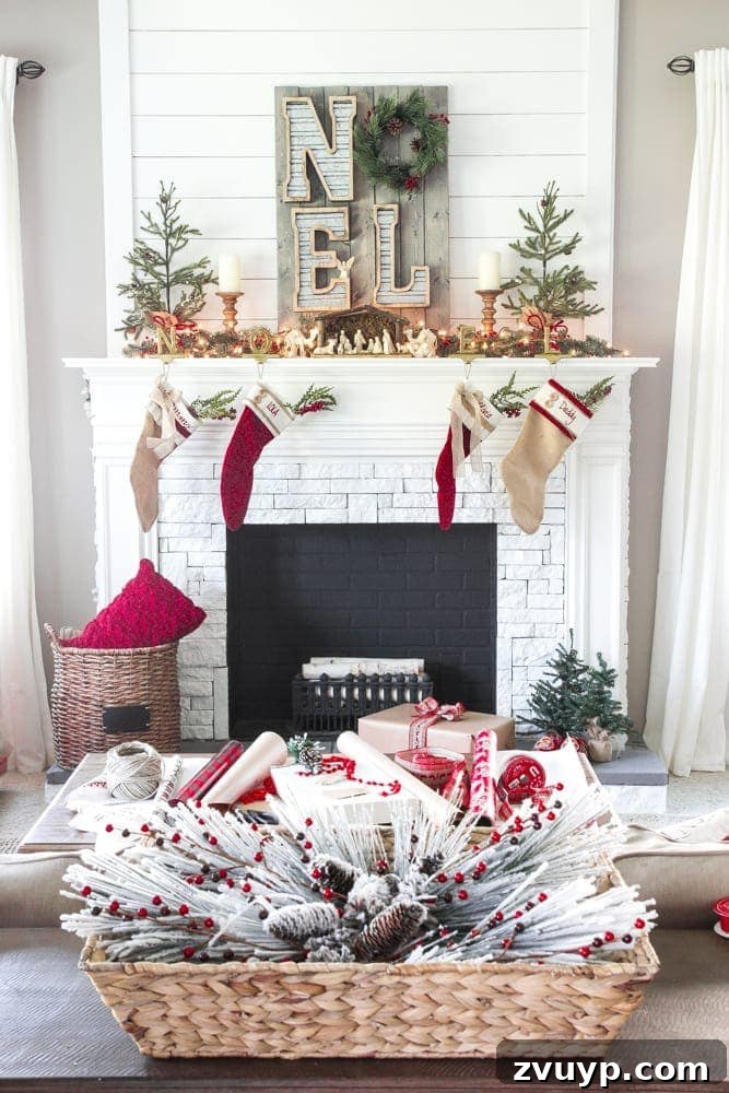 Three Years, One Home: The Transformation Tour 14 Living room after faux fireplace and other DIYs: cozy and festive with a grand fireplace, decorated for Christmas.