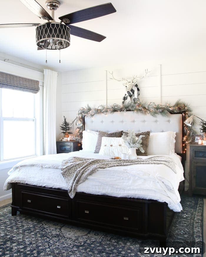 Three Years, One Home: The Transformation Tour 34 Master bedroom after makeover: a serene sanctuary with a DIY planked board and batten focal wall and framed windows, decorated for Christmas.