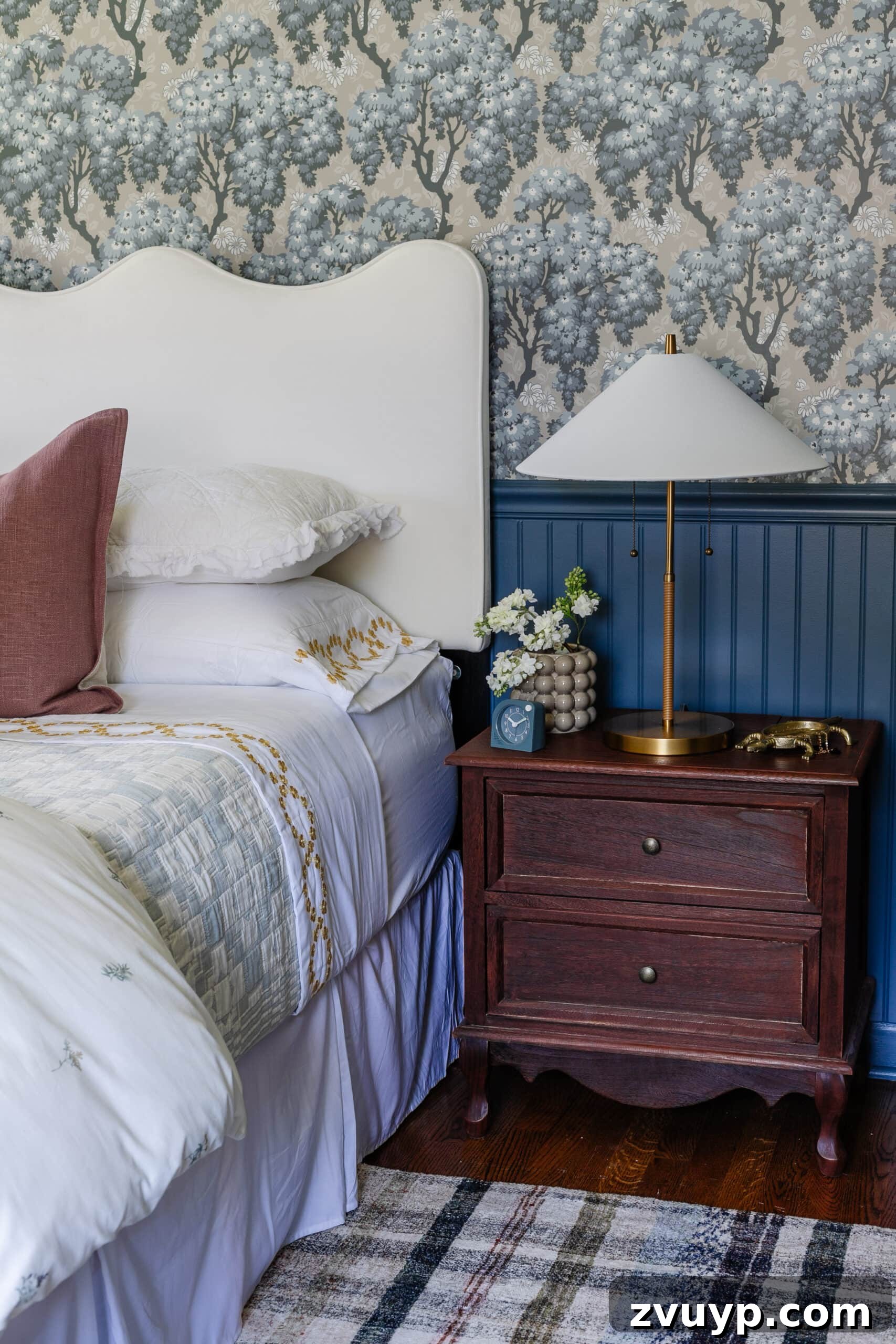 The Complete Home Deep Clean Blueprint 4 A pristine teen's bedroom, featuring a neatly made bed, organized furniture, and charming blue floral wallpaper, highlighting the refreshing outcome of a deep clean.