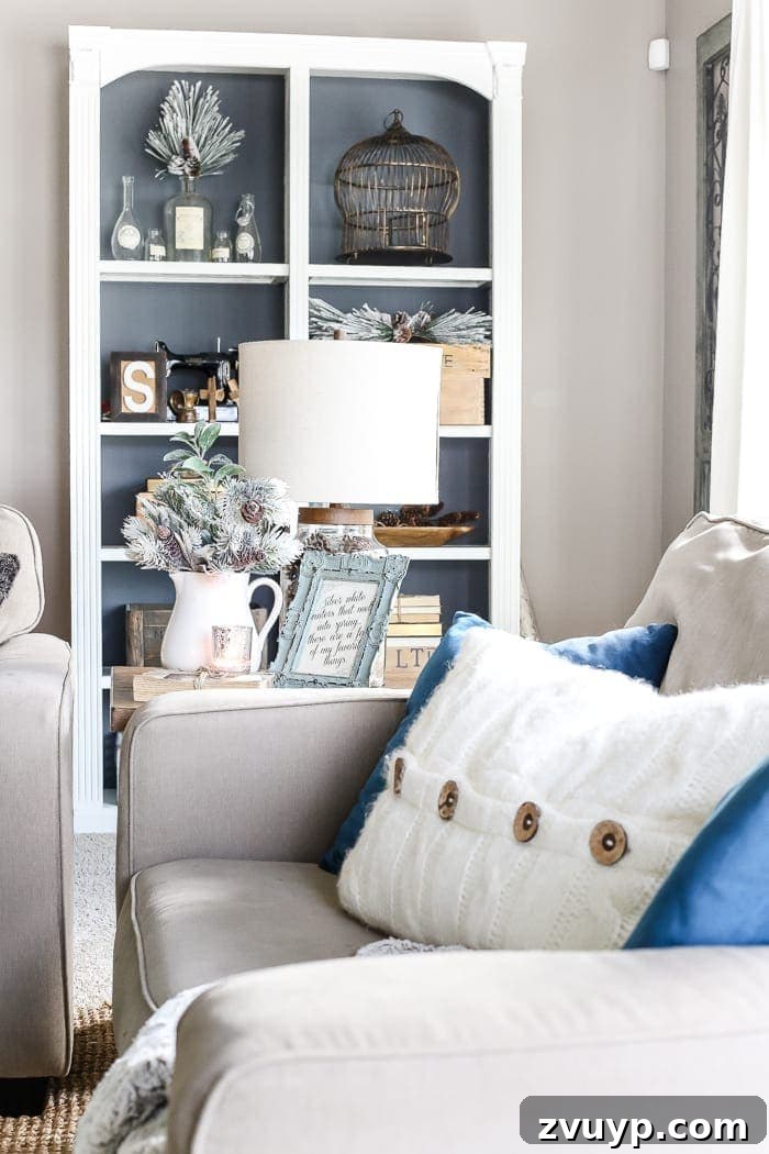 After-Christmas Winter Mantel and Living Room: A tour of an after-Christmas winter mantel and living room with thrifty ideas and creative budget decor to help bring warmth and life to your home.