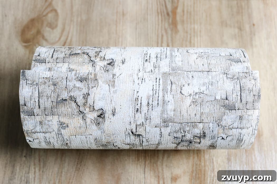 Crafting a Natural Birch Bark Vase 6 DIY Birch Bark Vase from an Oatmeal Can | blesserhouse.com - A quick tutorial for how to make a DIY birch bark vase for cheap using items from your pantry to create a cozy style for displaying faux florals.