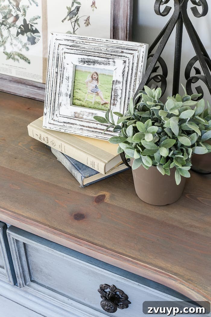 Azure Dream: My Dresser's French Blue Revival 12 French Blue Dresser Makeover | Detailed shot of the Weathered Oak stained dresser top, showcasing its elegant finish.
