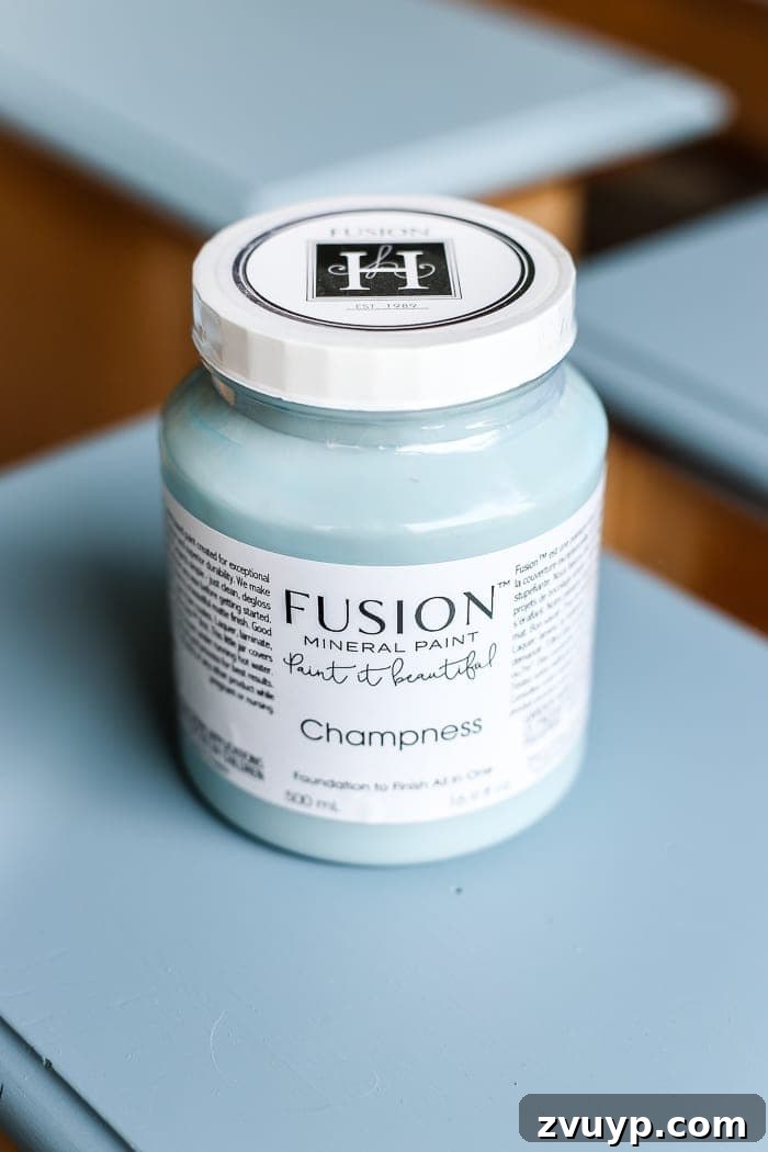 Azure Dream: My Dresser's French Blue Revival 5 French Blue Dresser Makeover | Applying Fusion Mineral Paint in Champness to a thrifted dresser, creating a beautiful French blue base for the makeover.