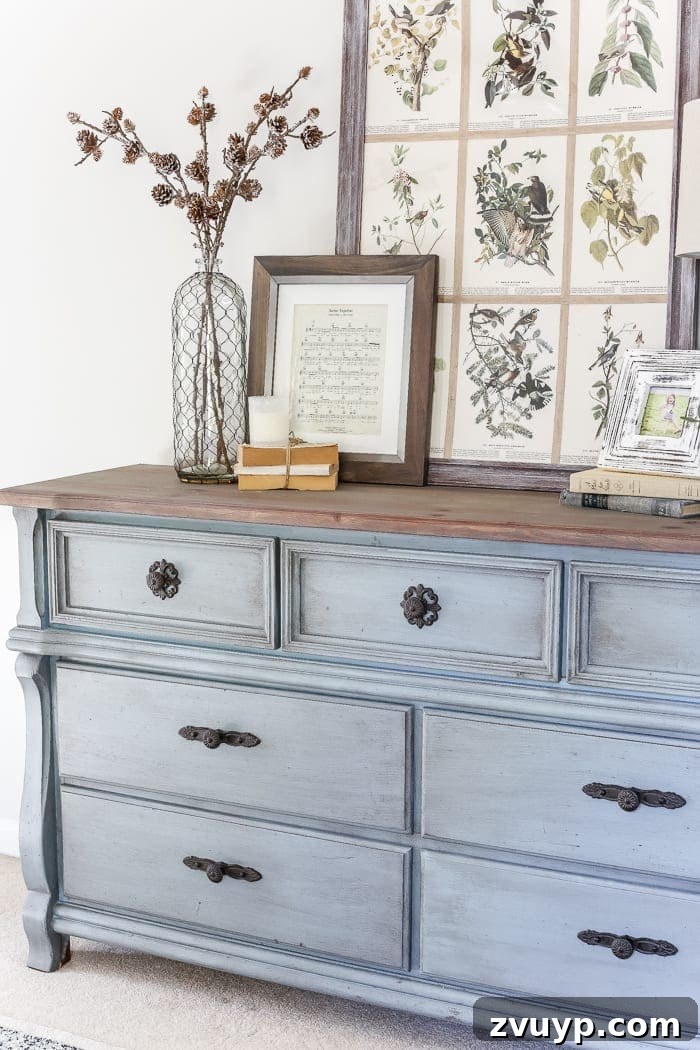 Azure Dream: My Dresser's French Blue Revival 9 French Blue Dresser Makeover | A close-up of the elegant French blue dresser, highlighting the painted finish and new cast iron hardware.