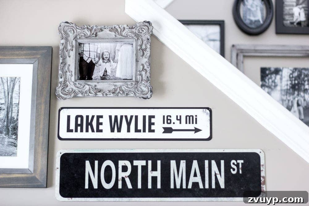 Transform Your Builder Home with Farmhouse Style 25 A large horizontal antique-style sign featuring a family name and