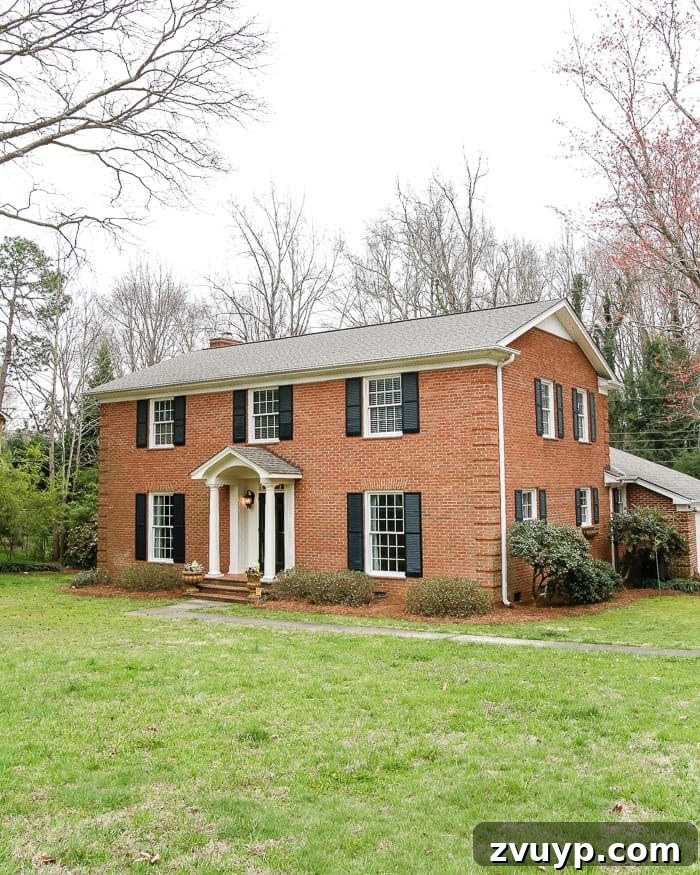 Our New Place First Look 10 Another angle of the elegant brick Colonial exterior