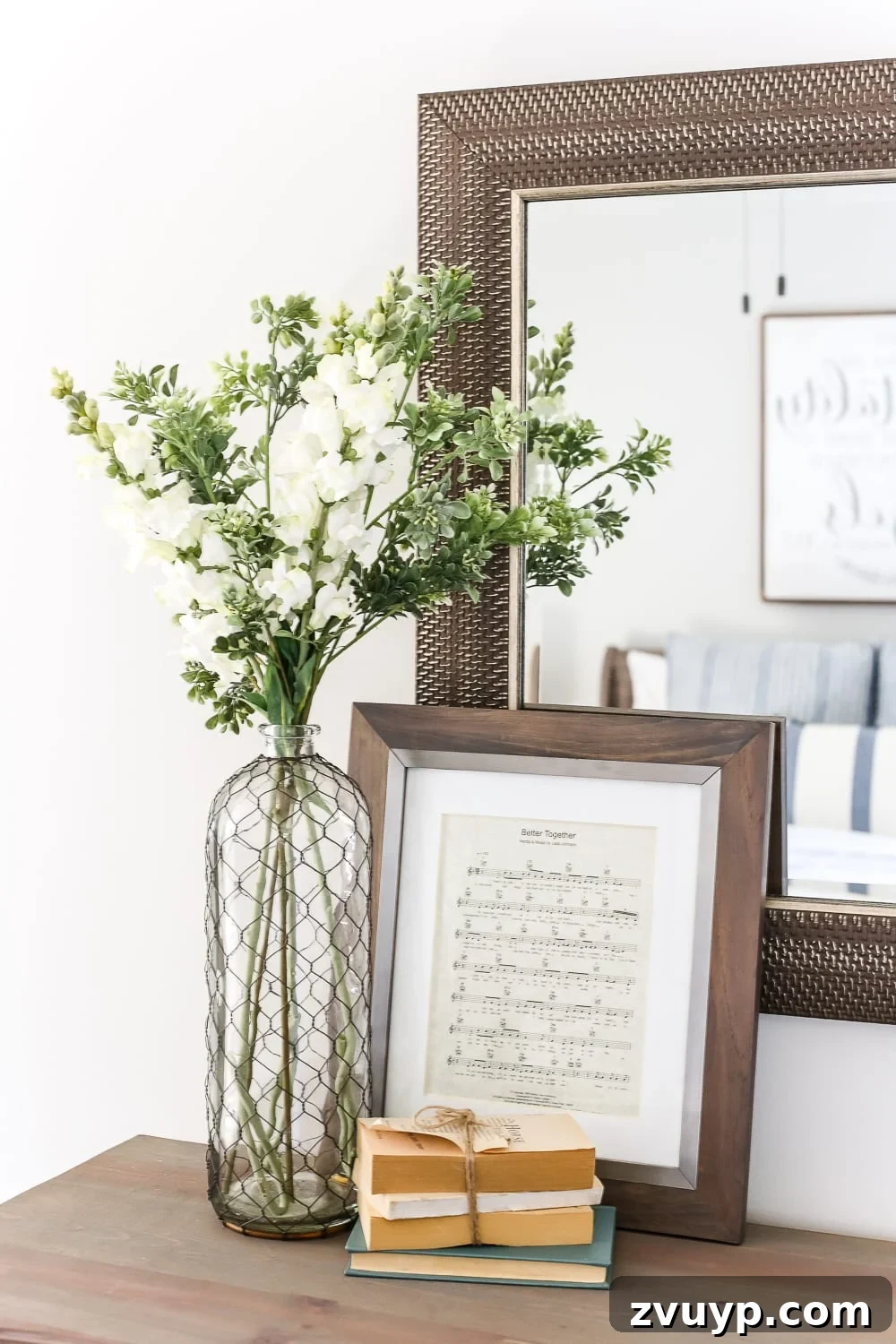 Curated decor items on the nightstand, showcasing budget-friendly finds and personal touches.