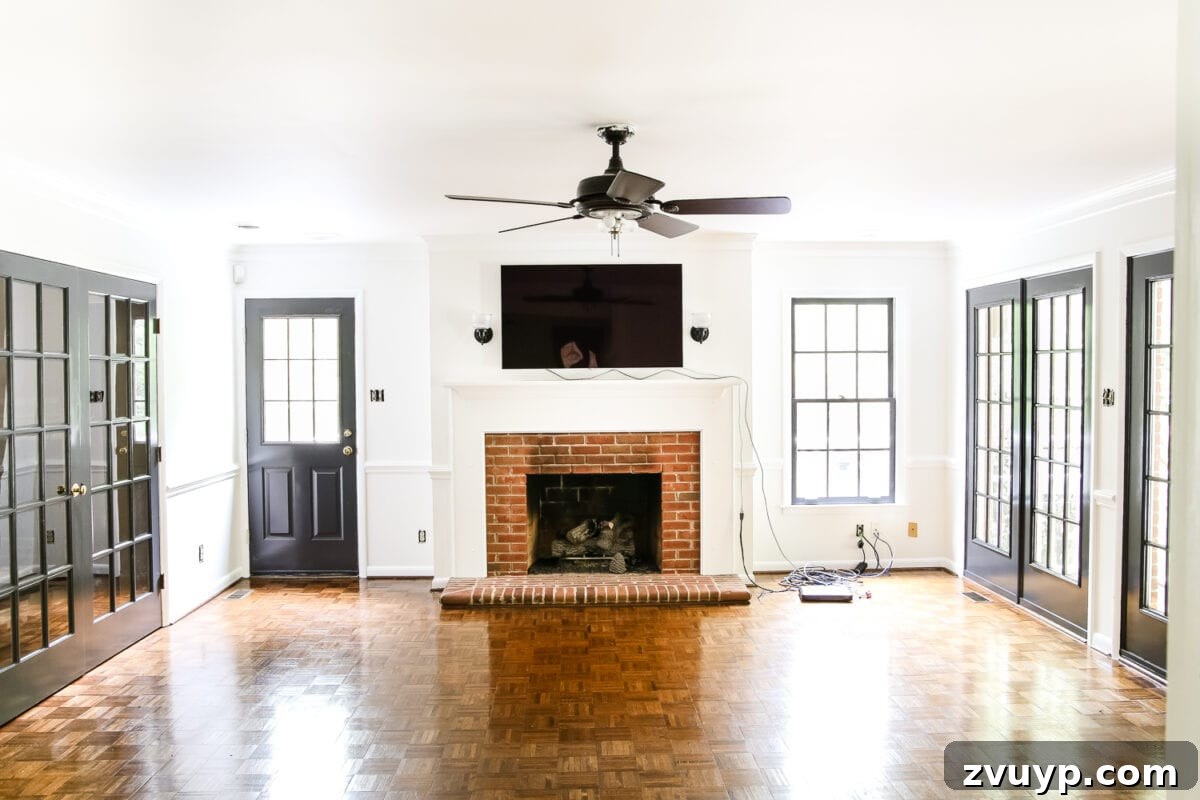 Dramatic Contrasts Living Room Paint Update 5 Modern living room with creamy white walls and bright white trim