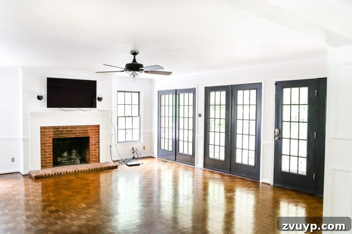Dramatic Contrasts Living Room Paint Update 6 Living room with dramatic dark doors in Benjamin Moore Wrought Iron and light walls