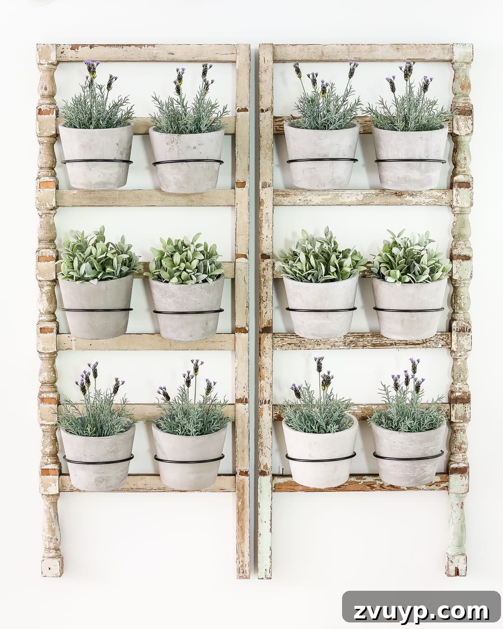Heirloom Railing Wall Garden 11 DIY Antique Banister Wall Planter | www.blesserhouse.com - A quick and simple tutorial for how to make a wall planter from a repurposed antique banister using artificial plants. Cute way to bring the outdoors in!