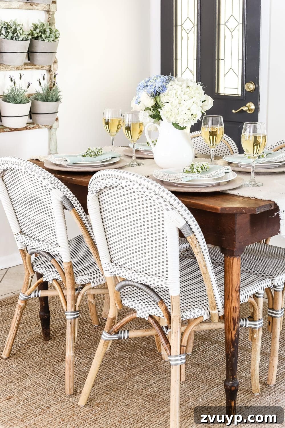 Explore a Modern French Farmhouse Summer Oasis 4 Modern French Farmhouse Summer Home Tour: Dining Table with Flowers