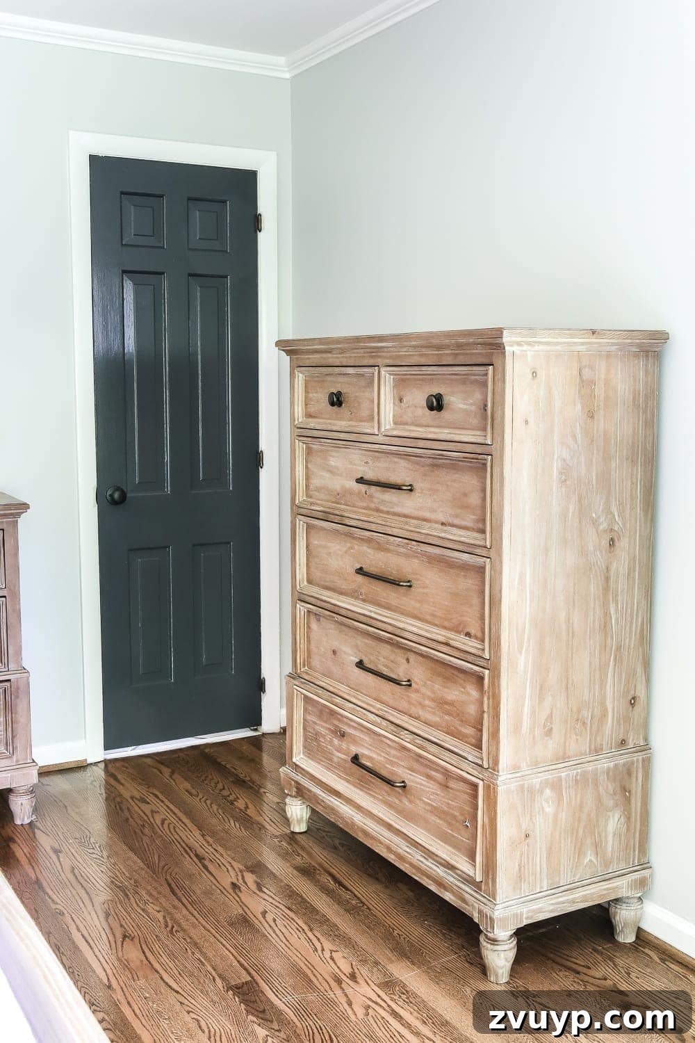 Pickled Pine Perfection for Your Master Retreat 8 Spacious pickled pine dresser in the master bedroom, ready for a decorative mirror to complete its look and enhance the room's lighting and style.