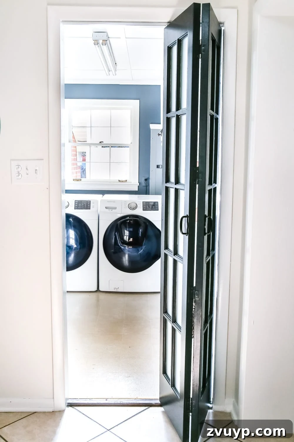 French Bifold Door A Chic Laundry Room Refresh 2 Laundry Room Updates: French Bifold Door | blesserhouse.com - A rickity laundry room bifold door gets a beautiful and functional update with a French bifold door with frosted glass for hiding messes in a stylish way.