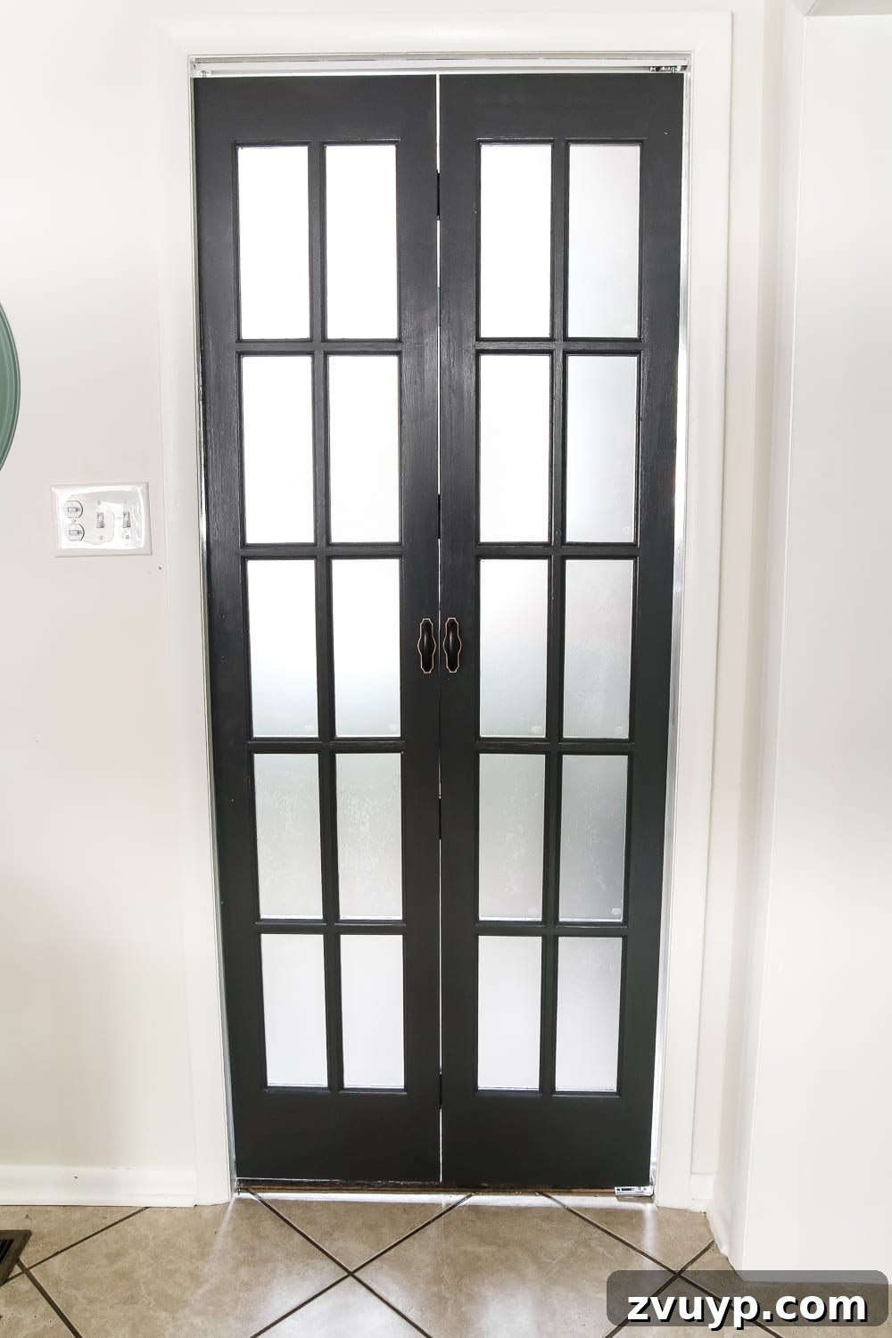 French Bifold Door A Chic Laundry Room Refresh 5 Laundry Room Updates: French Bifold Door | blesserhouse.com - A rickity laundry room bifold door gets a beautiful and functional update with a French bifold door with frosted glass for hiding messes in a stylish way.