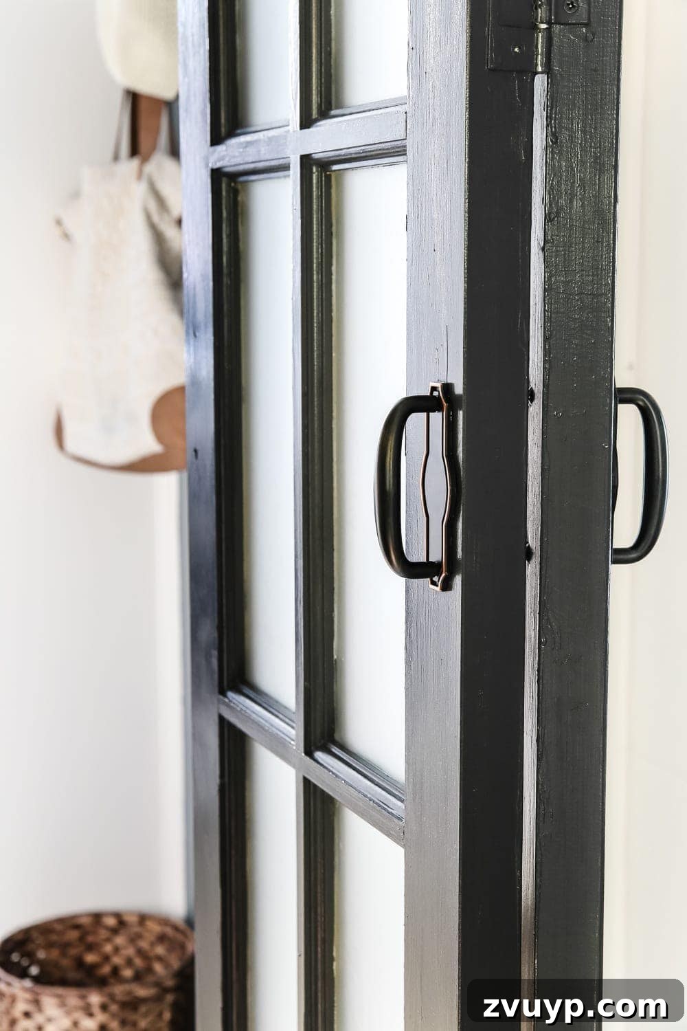 French Bifold Door A Chic Laundry Room Refresh 6 Laundry Room Updates: French Bifold Door | blesserhouse.com - A rickity laundry room bifold door gets a beautiful and functional update with a French bifold door with frosted glass for hiding messes in a stylish way.