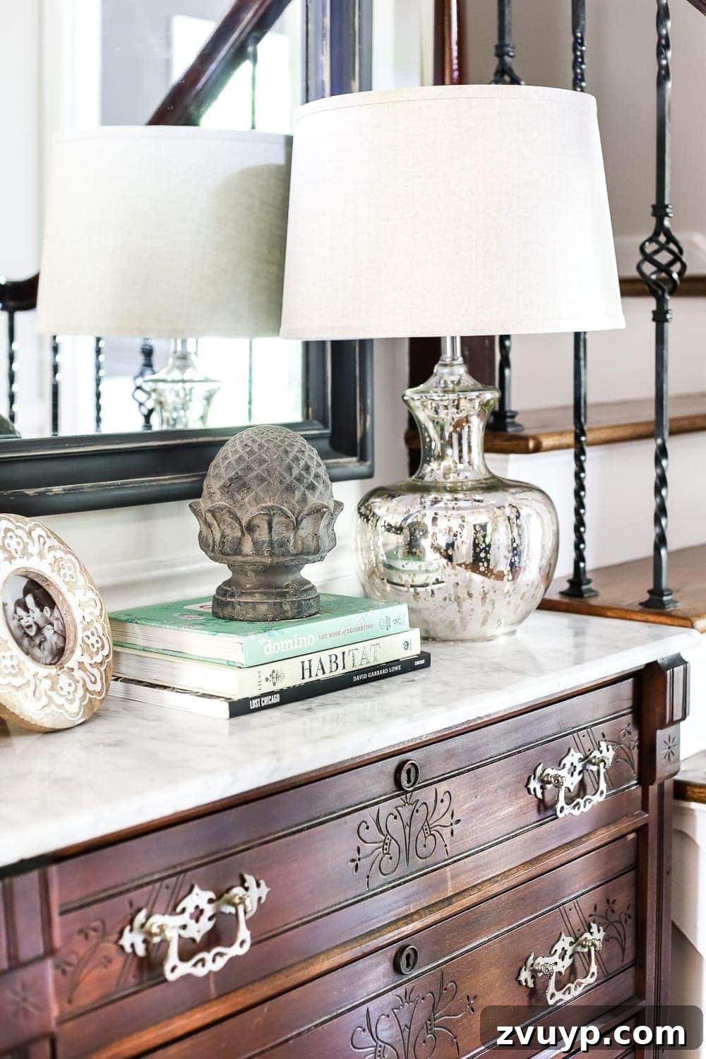 Elevate Your Entryway: Banish Marble Stains and Revamp Your Foyer Chest 11 Styled foyer details: lamp, plant, and frame