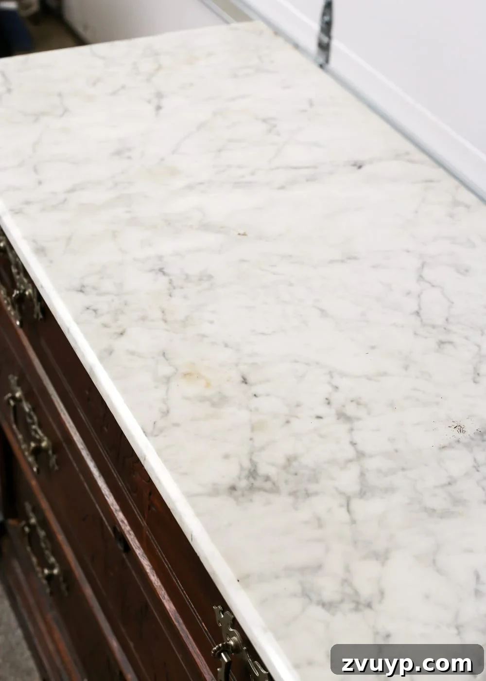 Elevate Your Entryway: Banish Marble Stains and Revamp Your Foyer Chest 3 Close-up of stained marble before cleaning