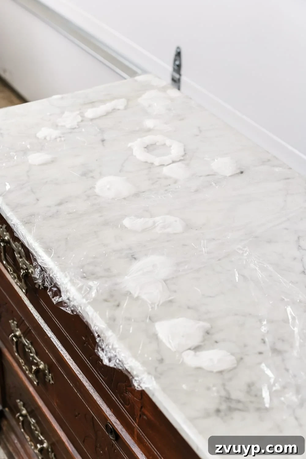 Elevate Your Entryway: Banish Marble Stains and Revamp Your Foyer Chest 5 Applying baking soda paste to marble stains