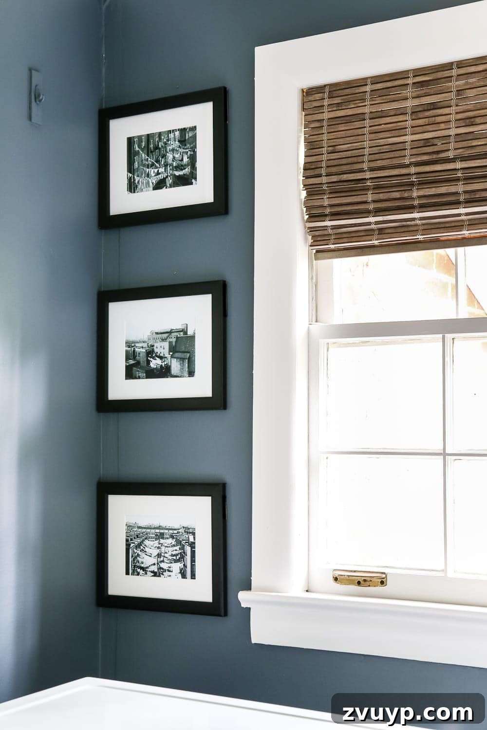 Charming Laundry Day Decor Printables 11 Laundry room window adorned with a new driftwood Roman shade, enhancing texture and light control.