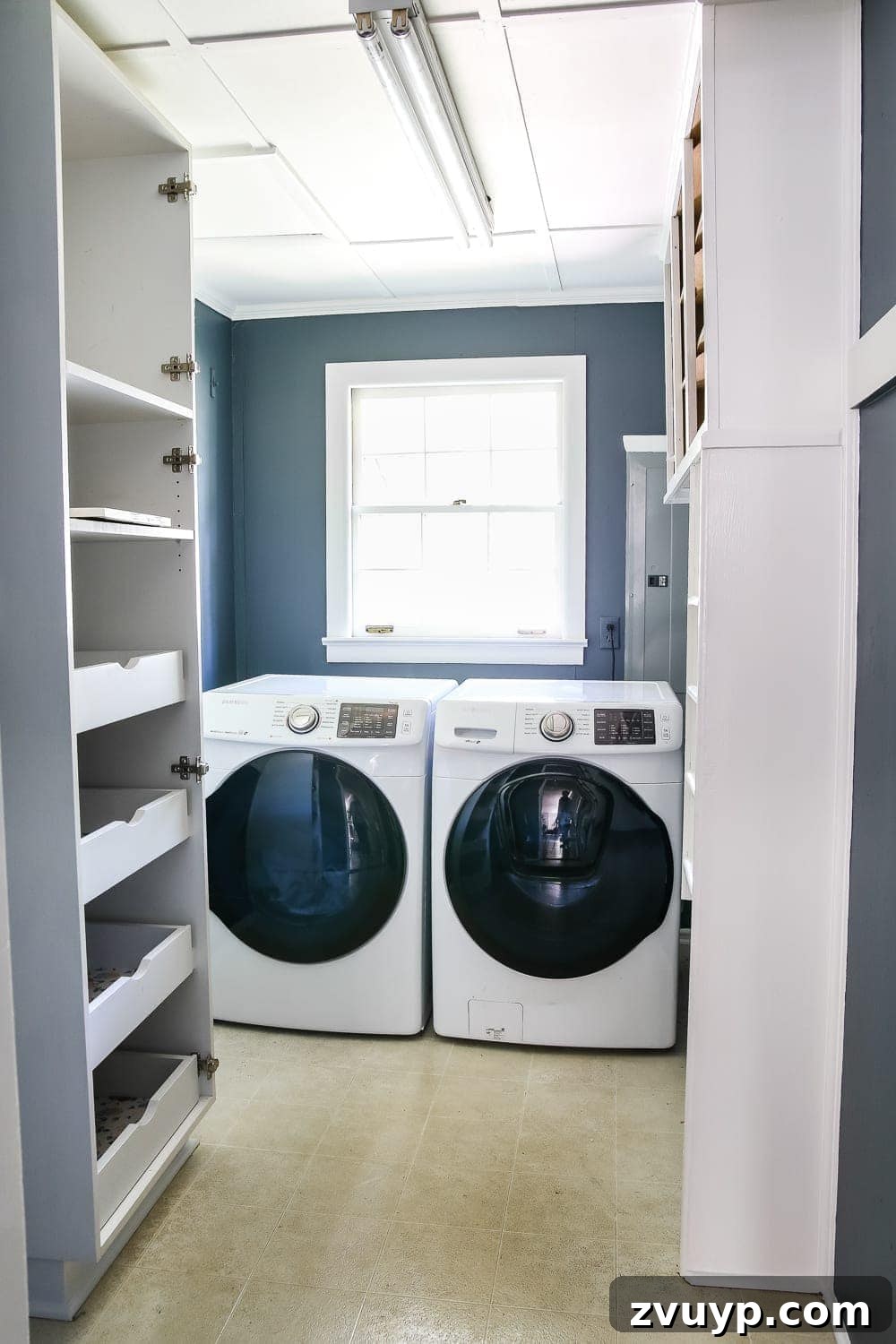 Charming Laundry Day Decor Printables 4 Laundry room after painting with Sherwin Williams Slate Tile, showcasing a more sophisticated atmosphere.