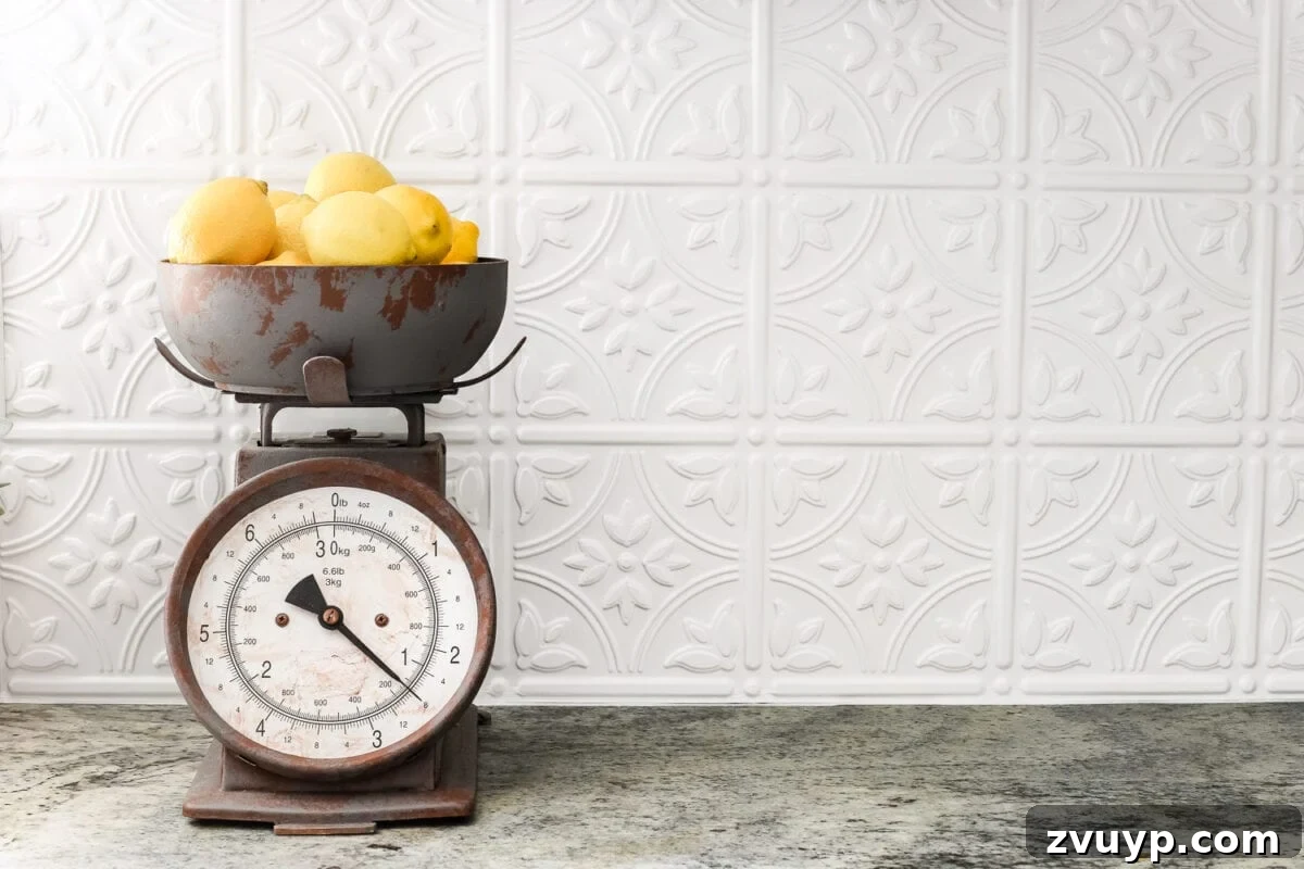 DIY Pressed Tin Kitchen Backsplash Project 12 DIY Pressed Tin Kitchen Backsplash | blesserhouse.com - How to makeover a kitchen backsplash with a pressed tin farmhouse style inexpensively and in 6 hours, no power tools required.