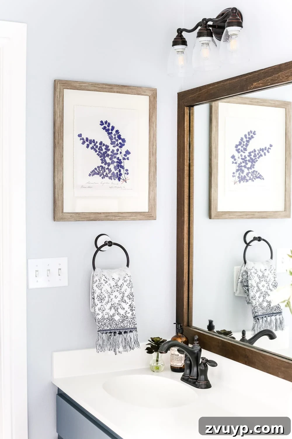 Stunning Bathroom Transformation Unveiled with Lowe's 33 Lowe's Spring Makeover Bathroom Reveal | blesserhouse.com - A team of 6 DIYers take on a bathroom makeover in 48 hours to transform a plain, builder grade space to give it character and modern farmhouse charm.