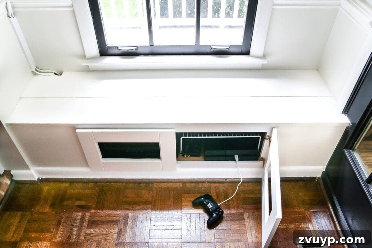 Kitchen Cabinet to Cozy Window Seat 11 DIY Window Seat from a Kitchen Cabinet | blesserhouse.com - A simplified tutorial for how to build a DIY window seat using a prefabbed kitchen cabinet to house electronics and hide cords.