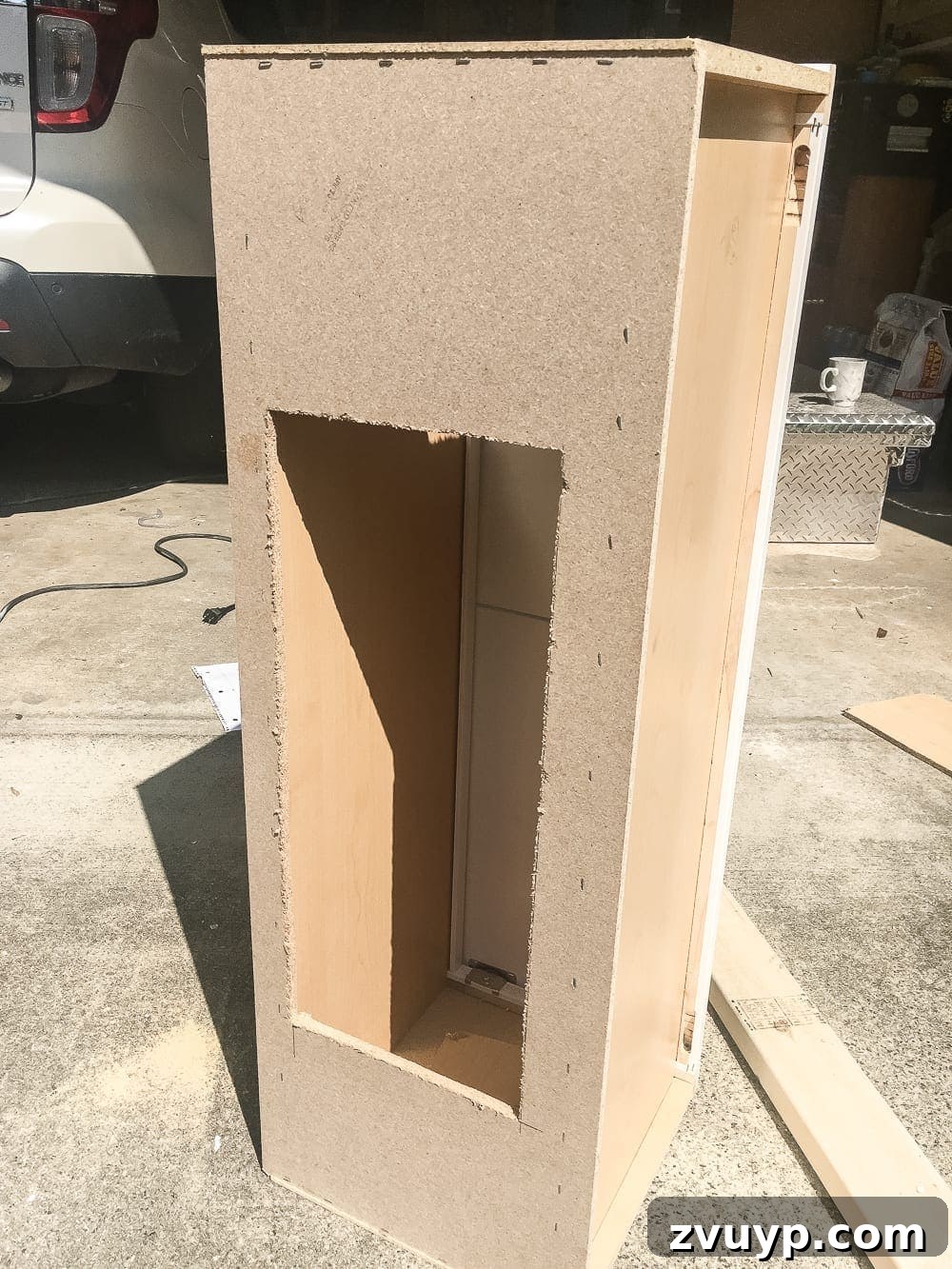 Kitchen Cabinet to Cozy Window Seat 6 DIY Window Seat from a Kitchen Cabinet | blesserhouse.com - A simplified tutorial for how to build a DIY window seat using a prefabbed kitchen cabinet to house electronics and hide cords.