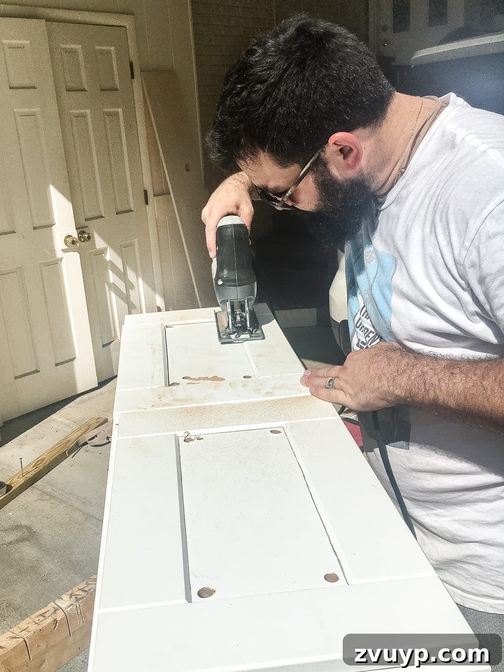 Kitchen Cabinet to Cozy Window Seat 7 DIY Window Seat from a Kitchen Cabinet | blesserhouse.com - A simplified tutorial for how to build a DIY window seat using a prefabbed kitchen cabinet to house electronics and hide cords.