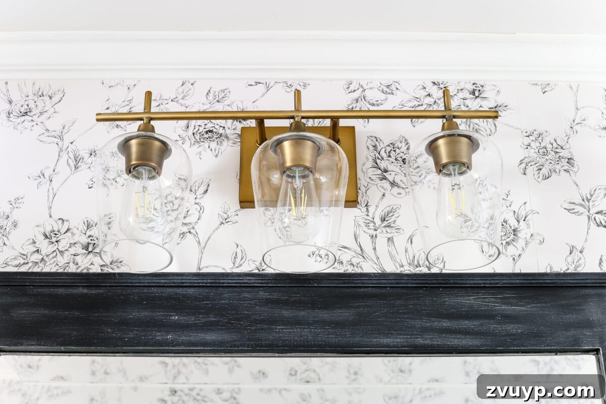 Aqua Urban Sanctuary Reveal 13 Aqua Meets Urban Powder Room Reveal | blesserhouse.com - A dated powder room gets a modern meets traditional, urban meets farmhouse makeover with aquas, black and white, and antique brass.
