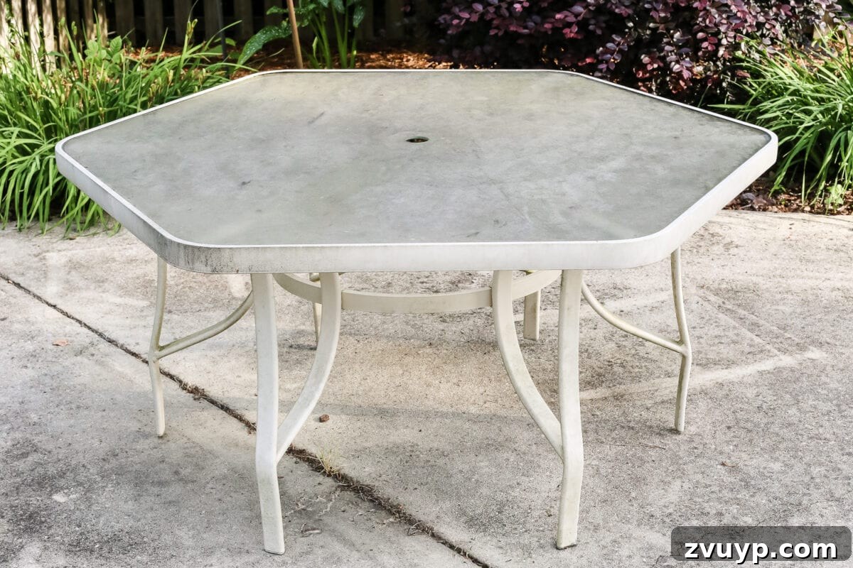Achieve a Streak-Free Shine on Your Patio Glass Table 3 How to Revive a Glass Patio Table | blesserhouse.com - A tutorial explaining how to clean, paint, and revive a glass patio table to make it look brand new in a few quick steps.